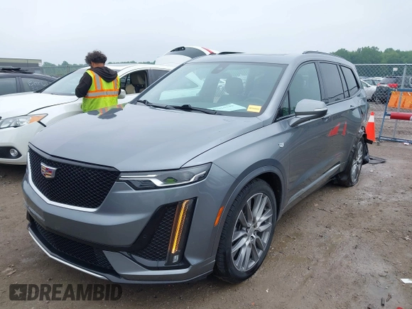 2021 Cadillac XT6 Sport with VIN 1GYKPGRS6MZ128112, listed as a IAAI auction lot 42415342 with 57,680 mi miles and . Bid and sale history available at DreamBid. Image 17.