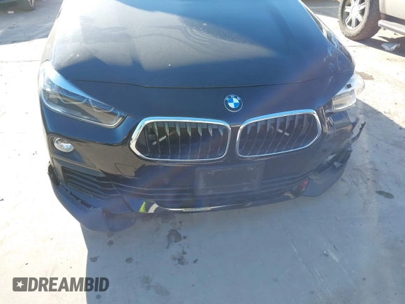 2019 BMW X2 sDrive28i with VIN WBXYJ3C50KEP77327, listed as a IAAI auction lot 40922194 with 94,672 mi miles. Bid and sale history available at carsss.com. Image 20.