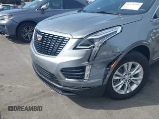2023 Cadillac XT5 FWD Luxury z VIN 1GYKNAR49PZ137556, wystawiony jako IAAI lot #41934199 z przebiegiem 13 298 mil mil oraz . Historia ofert i sprzedaży dostępna na DreamBid. Obrazek 6.