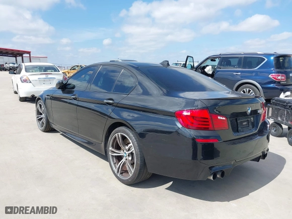 2013 BMW M5 with VIN WBSFV9C54DD095547, listed as a IAAI auction lot 41601733 with 1 mi miles. Bid and sale history available at carsss.com. Image 3.