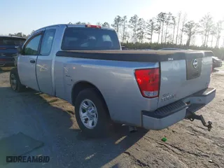 2004 Nissan Titan XE with VIN 1N6AA06A34N579377, listed as a IAAI auction lot 41725829 with 220,777 mi miles. Bid and sale history available at carsss.com. Image 3.