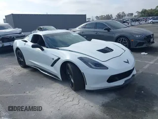 2014 Chevrolet Corvette 1LT z VIN 1G1YB2D72E5123317, wystawiony jako IAAI lot #42403964 z przebiegiem 36 113 mil mil oraz . Historia ofert i sprzedaży dostępna na DreamBid. Obrazek 1.