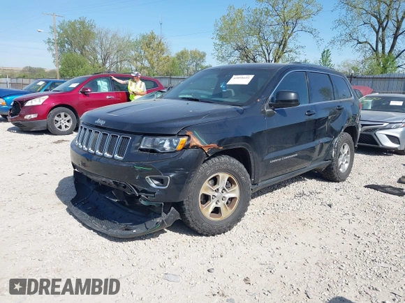 2014 Jeep Grand Cherokee Laredo with VIN 1C4RJEAG0EC442053, listed as a IAAI auction lot 42098601 with 200,982 mi miles and . Bid and sale history available at DreamBid. Image 2.