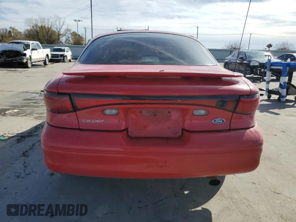 2000 Ford Escort ZX2 z VIN 3FAKP1136YR102665, wystawiony jako Copart lot #83805634 z przebiegiem 77 954 mil mil oraz Szkoda całkowita • Salvage title. Historia ofert i sprzedaży dostępna na DreamBid. Obrazek 6.