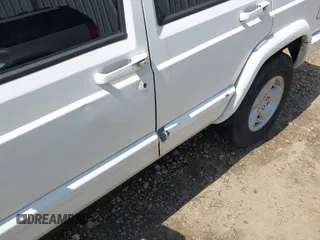 2001 Jeep Cherokee Sport with VIN 1J4FT48S71L503551, listed as a IAAI auction lot 42660835 with Not provided miles and . Bid and sale history available at DreamBid. Image 13.