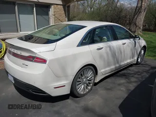 2014 Lincoln MKZ with VIN 3LN6L2G95ER827769, listed as a IAAI auction lot 42109075 with 154,000 mi miles. Bid and sale history available at carsss.com. Image 4.