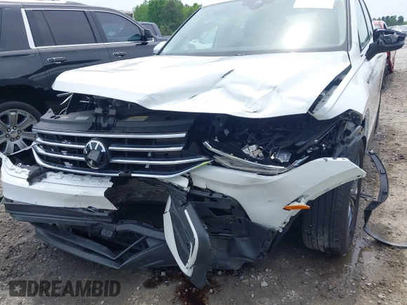 2022 Volkswagen Tiguan SE with VIN 3VV3B7AX3NM176770, listed as a IAAI auction lot 42114378 with 37,448 mi miles and . Bid and sale history available at DreamBid. Image 6.