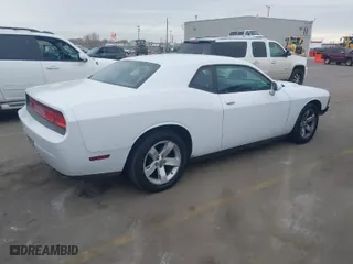 2014 Dodge Challenger SXT with VIN 2C3CDYAG8EH126884, listed as a IAAI auction lot 41423275 with 334,497 mi miles. Bid and sale history available at carsss.com. Image 4.