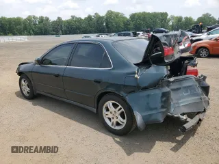 1999 Honda Accord LX with VIN 1HGCG6650XA028790, listed as a Copart auction lot 61014405 with 362,319 mi miles and Salvage title. Bid and sale history available at DreamBid. Image 2.