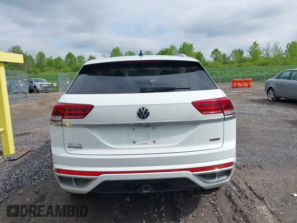 2021 Volkswagen Atlas SEL z VIN 1V2SE2CA7MC214805, wystawiony jako IAAI lot #42374591 z przebiegiem 61 775 mil mil oraz . Historia ofert i sprzedaży dostępna na DreamBid. Obrazek 17.