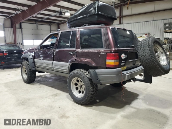 1996 Jeep Grand Cherokee Laredo with VIN 1J4GZ58Y1TC171915, listed as a Copart auction lot 50764034 with 0 mi miles and Salvage Title. Bid and sale history available at carsss.com. Image 2.