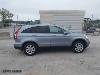 2009 Honda CR-V EX-L with VIN JHLRE387X9C006124, listed as a IAAI auction lot 41757092 with 142,038 mi miles. Bid and sale history available at carsss.com. Image 13.
