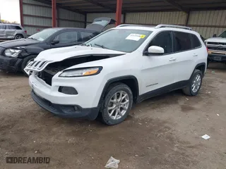 2015 Jeep Cherokee Latitude with VIN 1C4PJLCB5FW737467, listed as a IAAI auction lot 41125508 with 132,463 mi miles. Bid and sale history available at carsss.com. Image 17.