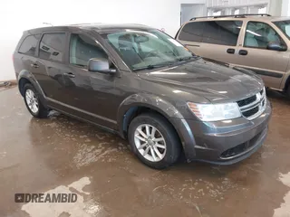 2014 Dodge Journey American Value Pkg with VIN 3C4PDCAB1ET153064, listed as a IAAI auction lot 41254848 with 179,905 mi miles. Bid and sale history available at carsss.com. Image 1.