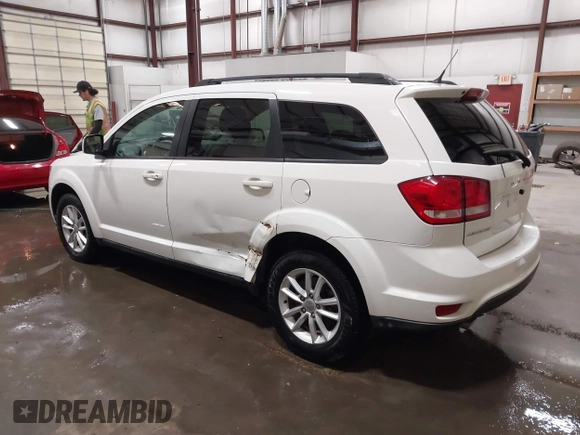 2015 Dodge Journey SXT with VIN 3C4PDCBG6FT709042, listed as a IAAI auction lot 41979307 with 116,713 mi miles and . Bid and sale history available at DreamBid. Image 3.