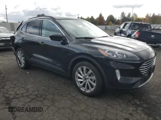 2021 Ford Escape Titanium with VIN 1FMCU9J98MUA73257, listed as a Copart auction lot 74838394 with 41,294 mi miles and Salvage Title. Bid and sale history available at carsss.com. Image 4.