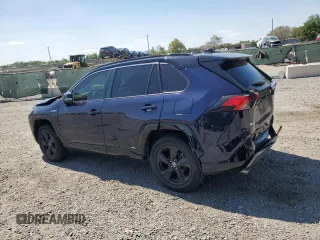 2021 Toyota RAV4 Hybrid XSE with VIN 2T3E6RFV9MW016128, listed as a Copart auction lot 53323945 with 134,009 mi miles and Salvage title. Bid and sale history available at DreamBid. Image 2.
