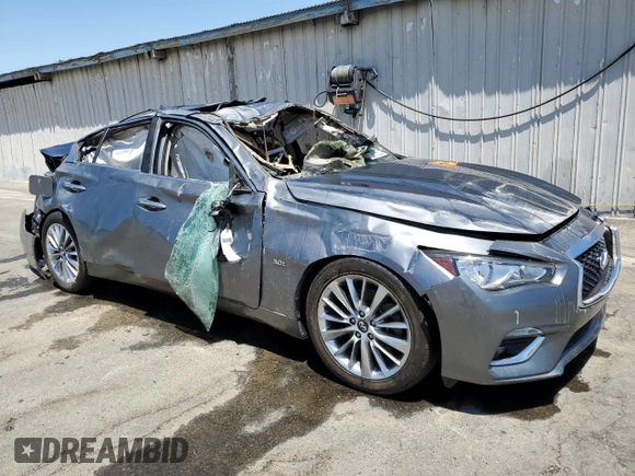 2019 Infiniti Q50 Signature Edition with VIN JN1EV7AP7KM517239, listed as a Copart auction lot 58093944 with 63,177 mi miles and Salvage Title. Bid and sale history available at DreamBid. Image 4.