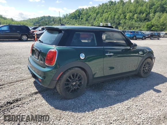 2014 MINI Hardtop S with VIN WMWXM7C50ET970033, listed as a Copart auction lot 56160735 with 125,208 mi miles and Salvage title. Bid and sale history available at DreamBid. Image 3.