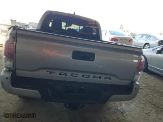 2021 Toyota Tacoma 4WD SR with VIN 3TMCZ5AN6MM393306, listed as a Copart auction lot 41483325 with 57,217 mi miles and Salvage Title. Bid and sale history available at carsss.com. Image 6.