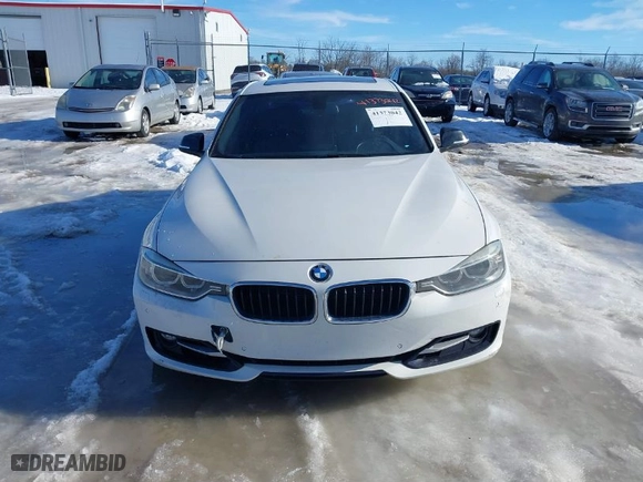 2014 BMW 3 Series 335i xDrive with VIN WBA3B9G5XENR91793, listed as a IAAI auction lot 41373042 with 138,560 mi miles. Bid and sale history available at carsss.com. Image 12.