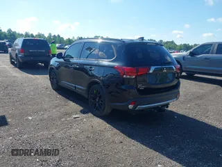 2018 Mitsubishi Outlander SE with VIN JA4AD3A34JZ055450, listed as a IAAI auction lot 42269912 with 85,013 mi miles and . Bid and sale history available at DreamBid. Image 3.