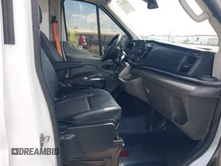 2022 Ford Transit Cargo with VIN 1FTBR3X89NKA23915, listed as a IAAI auction lot 42233534 with 3,755 mi miles and . Bid and sale history available at DreamBid. Image 5.