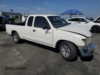 1999 Toyota Tacoma z VIN 4TAVL52N7XZ567598, wystawiony jako Copart lot #55141495 z przebiegiem 225 505 mil mil oraz Szkoda całkowita • Salvage title. Historia ofert i sprzedaży dostępna na DreamBid. Obrazek 4.