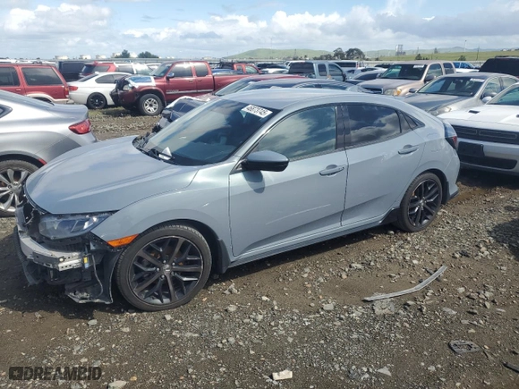 2021 Honda Civic Hatchback Sport with VIN SHHFK7H40MU401106, listed as a Copart auction lot 46873745 with 123,972 mi miles and Salvage Title. Bid and sale history available at carsss.com. Image 1.