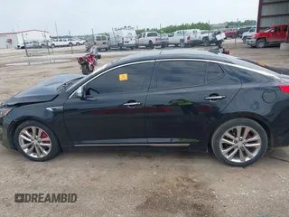 2014 Kia Optima SX Turbo with VIN 5XXGR4A65EG276131, listed as a IAAI auction lot 42429004 with 136,766 mi miles and . Bid and sale history available at DreamBid. Image 14.