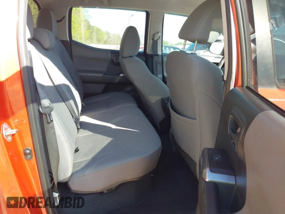 2018 Toyota Tacoma SR5 with VIN 5TFAZ5CN2JX069067, listed as a IAAI auction lot 41975459 with 92,434 mi miles and . Bid and sale history available at DreamBid. Image 8.