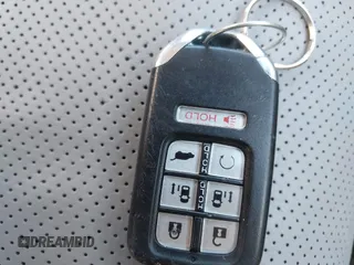 2018 Honda Odyssey Elite z VIN 5FNRL6H96JB004853, wystawiony jako IAAI lot #41877946 z przebiegiem 125 580 mil mil oraz . Historia ofert i sprzedaży dostępna na DreamBid. Obrazek 11.