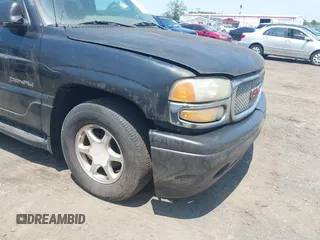 2003 GMC Yukon Denali z VIN 1GKEK63UX3J234604, wystawiony jako IAAI lot #42479968 z przebiegiem 319 855 mil mil oraz . Historia ofert i sprzedaży dostępna na DreamBid. Obrazek 6.