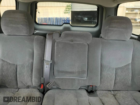 2004 Chevrolet Tahoe LS z VIN 1GNEC13V04J307606, wystawiony jako Copart lot #51999585 z przebiegiem 262 220 mil mil oraz Szkoda całkowita • Salvage title. Historia ofert i sprzedaży dostępna na DreamBid. Obrazek 10.