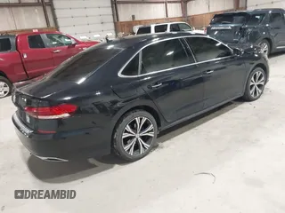 2021 Volkswagen Passat SE z VIN 1VWSA7A39MC001401, wystawiony jako IAAI lot #42019308 z przebiegiem 82 203 mil mil oraz . Historia ofert i sprzedaży dostępna na DreamBid. Obrazek 4.