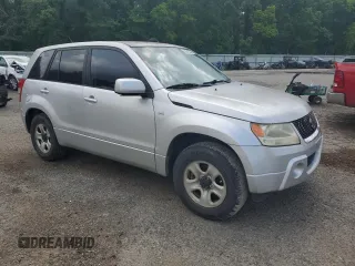 2006 Suzuki Grand Vitara z VIN JS3TE941764101657, wystawiony jako Copart lot #54943205 z przebiegiem 206 744 mil mil oraz Szkody całkowita. Historia ofert i sprzedaży dostępna na DreamBid. Obrazek 4.