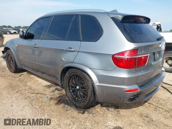 2012 BMW X5 50i with VIN 5UXZV8C56CL426081, listed as a IAAI auction lot 42084071 with 135,473 mi miles and . Bid and sale history available at DreamBid. Image 3.