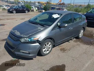 2011 Honda Insight EX z VIN JHMZE2H70BS011043, wystawiony jako IAAI lot #42537111 z przebiegiem 209 843 mil mil oraz . Historia ofert i sprzedaży dostępna na DreamBid. Obrazek 2.
