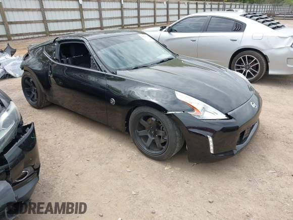 2016 Nissan 370Z with VIN JN1AZ4EHXGM935774, listed as a IAAI auction lot 41976743 with 66,979 mi miles. Bid and sale history available at carsss.com. Image 1.