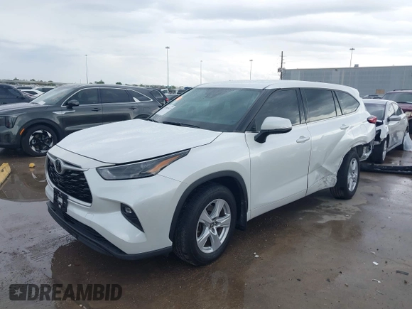 2022 Toyota Highlander LE z VIN 5TDBZRBH1NS216174, wystawiony jako IAAI lot #41903427 z przebiegiem 68 671 mil mil oraz . Historia ofert i sprzedaży dostępna na DreamBid. Obrazek 2.