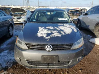 2014 Volkswagen Jetta SEL z VIN 3VWL17AJ6EM438176, wystawiony jako Copart lot #85081294 z przebiegiem 108 420 mil mil oraz Szkoda całkowita • Salvage title. Historia ofert i sprzedaży dostępna na DreamBid. Obrazek 5.