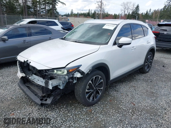 2023 Mazda CX-5 2.5 S Premium Plus Package with VIN JM3KFBEM3P0236481, listed as a IAAI auction lot 41815369 with 34,679 mi miles. Bid and sale history available at carsss.com. Image 18.