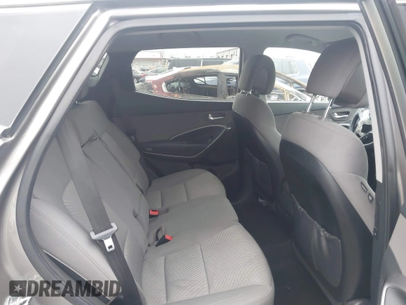 2018 Hyundai Santa Fe 2.4L with VIN 5XYZT3LB7JG569517, listed as a IAAI auction lot 42141100 with 57,854 mi miles and . Bid and sale history available at DreamBid. Image 8.