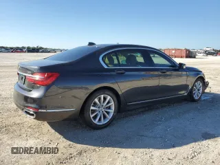 2018 BMW 7 Series 740i with VIN WBA7E2C55JG742497, listed as a Copart auction lot 82173994 with 52,354 mi miles and Salvage Title. Bid and sale history available at carsss.com. Image 3.
