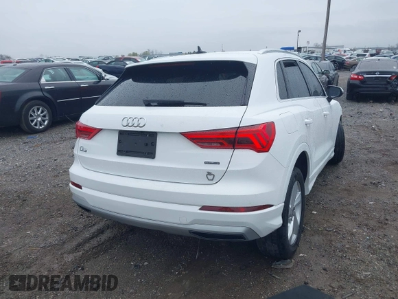 2020 Audi Q3 Premium with VIN WA1AECF35L1030273, listed as a IAAI auction lot 42006553 with 81,944 mi miles. Bid and sale history available at carsss.com. Image 4.