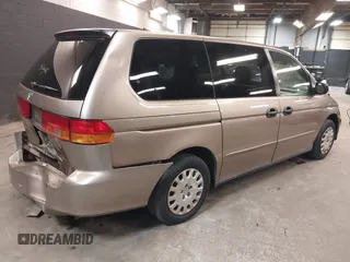 2004 Honda Odyssey LX with VIN 5FNRL18534B072936, listed as a IAAI auction lot 42366971 with 185,534 mi miles and . Bid and sale history available at DreamBid. Image 4.