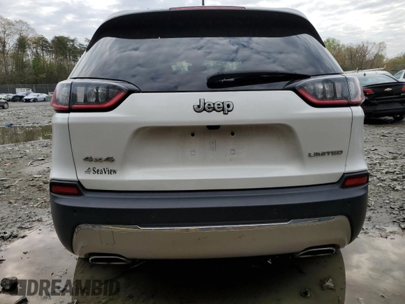 2019 Jeep Cherokee Limited with VIN 1C4PJMDX9KD158035, listed as a Copart auction lot 52871525 with 97,543 mi miles and Salvage Title. Bid and sale history available at DreamBid. Image 6.