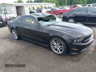 2012 Ford Mustang GT Premium with VIN 1ZVBP8CF1C5200585, listed as a IAAI auction lot 42473231 with 65,834 mi miles and . Bid and sale history available at DreamBid. Image 1.