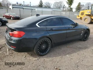 2016 BMW 4 Series 428i xDrive with VIN WBA4C9C59GG136078, listed as a Copart auction lot 49689895 with 143,135 mi miles and Salvage Title. Bid and sale history available at DreamBid. Image 3.