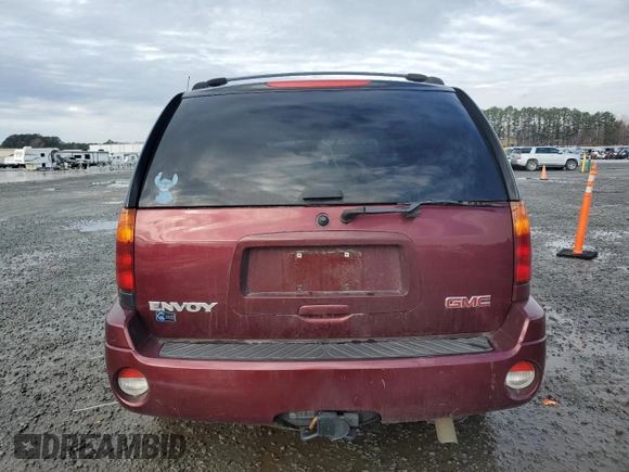 2003 GMC Envoy SLT with VIN 1GKDT13S032245485, listed as a Copart auction lot 84385304 with 139,183 mi miles and Salvage Title. Bid and sale history available at carsss.com. Image 6.
